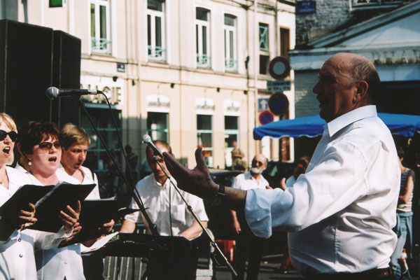 People enjoying the festival La Louche d'Or
